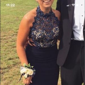 Navy beaded, backless, belted dress.